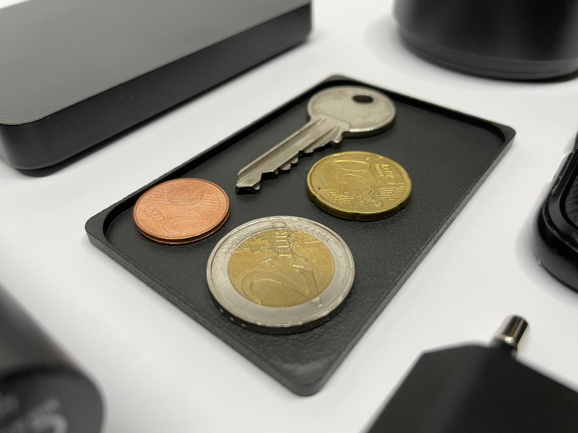 The coin tray also fits keys.